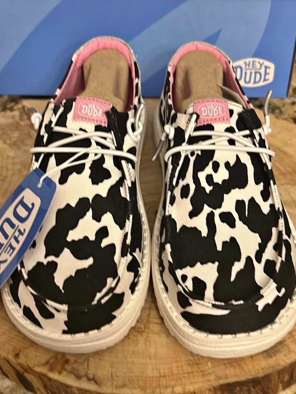 Hey Dude Cow Print Slip-On Shoes with Pink Accent - Picture 1 of 6